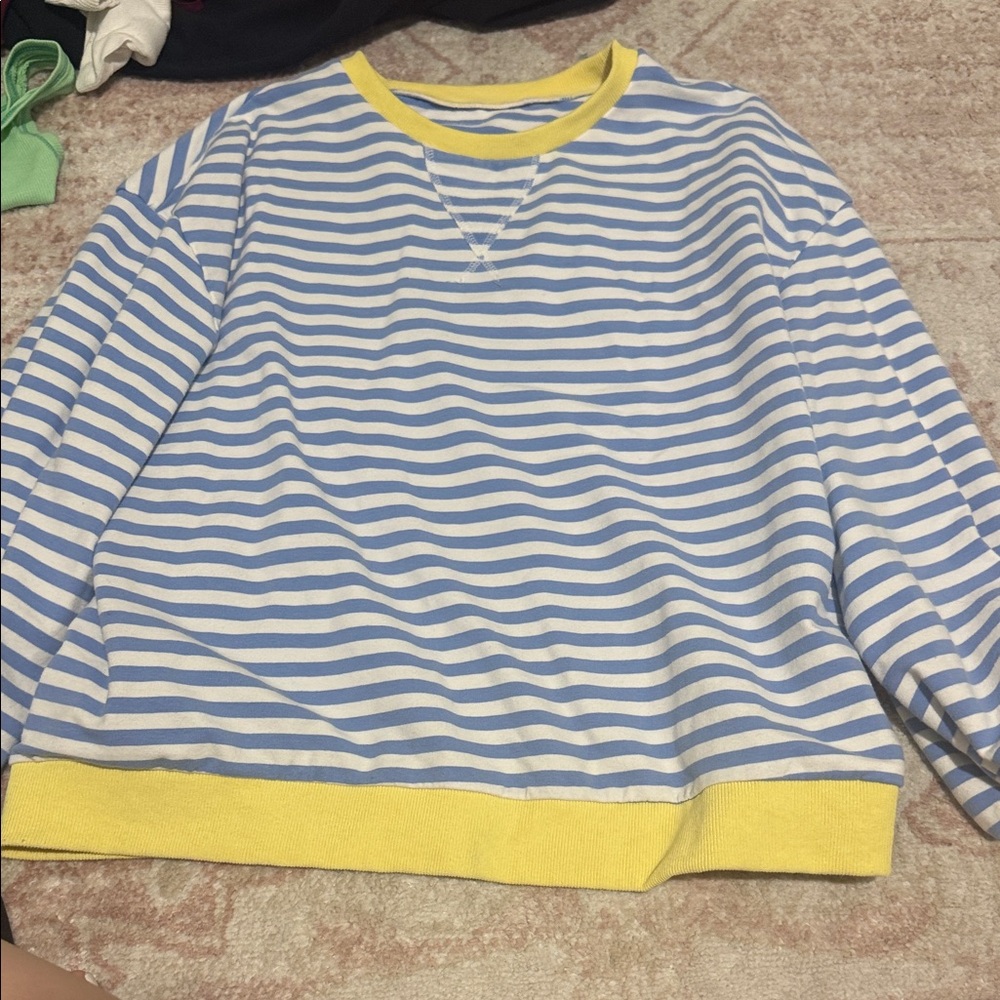 Blue and White Striped Sweatshirt with Yellow Accents